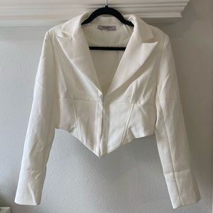 Long sleeve corset style top.